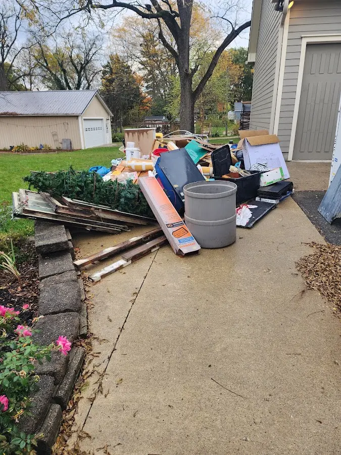Dumpster being loaded with debris for Residential Dumpster Rental in Centralia